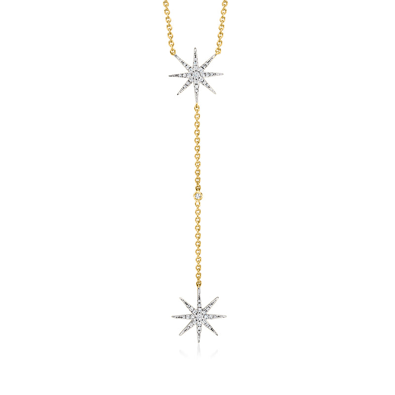Gold Y-necklace with two starburst pendants and white sparkle accents