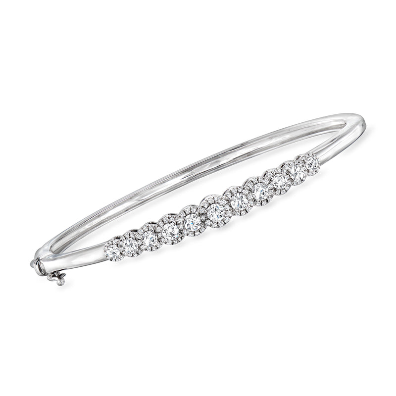 Diamond bangle bracelet in sterling silver with row of round diamonds