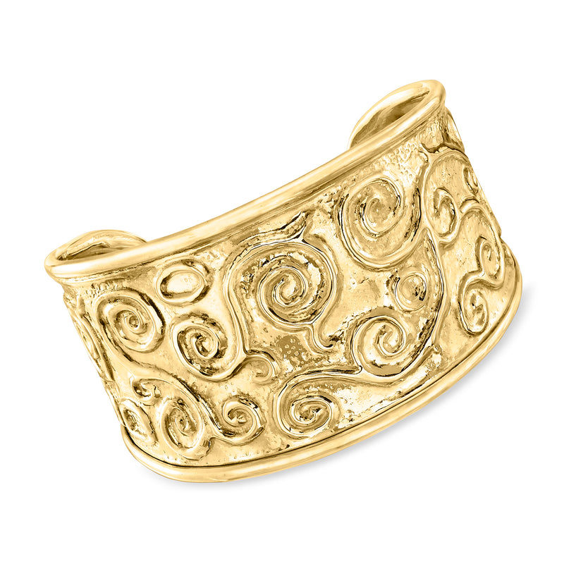 Gold-tone cuff bracelet with raised swirl pattern and rounded open end