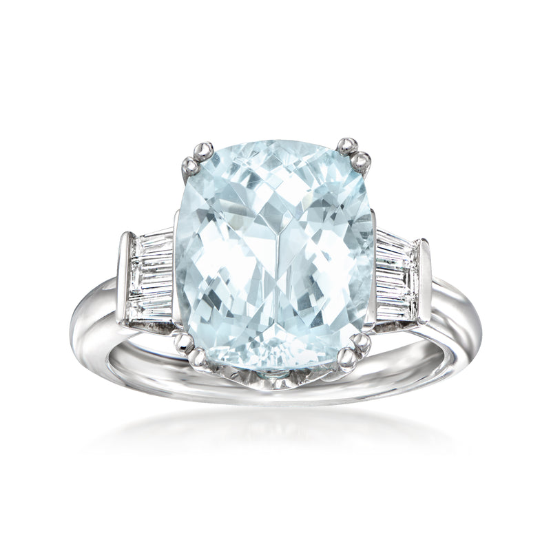 Oval aquamarine and diamond ring in 14kt white gold, prong-set with baguette sides