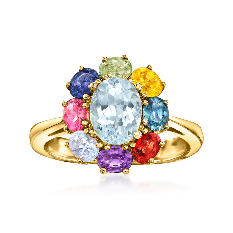 14kt yellow gold flower ring with oval aquamarine center and multicolored gemstone petals