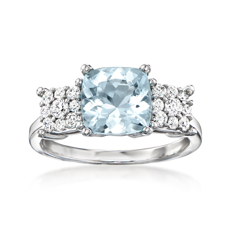 14kt white gold aquamarine ring with cushion-cut center and round diamond halo