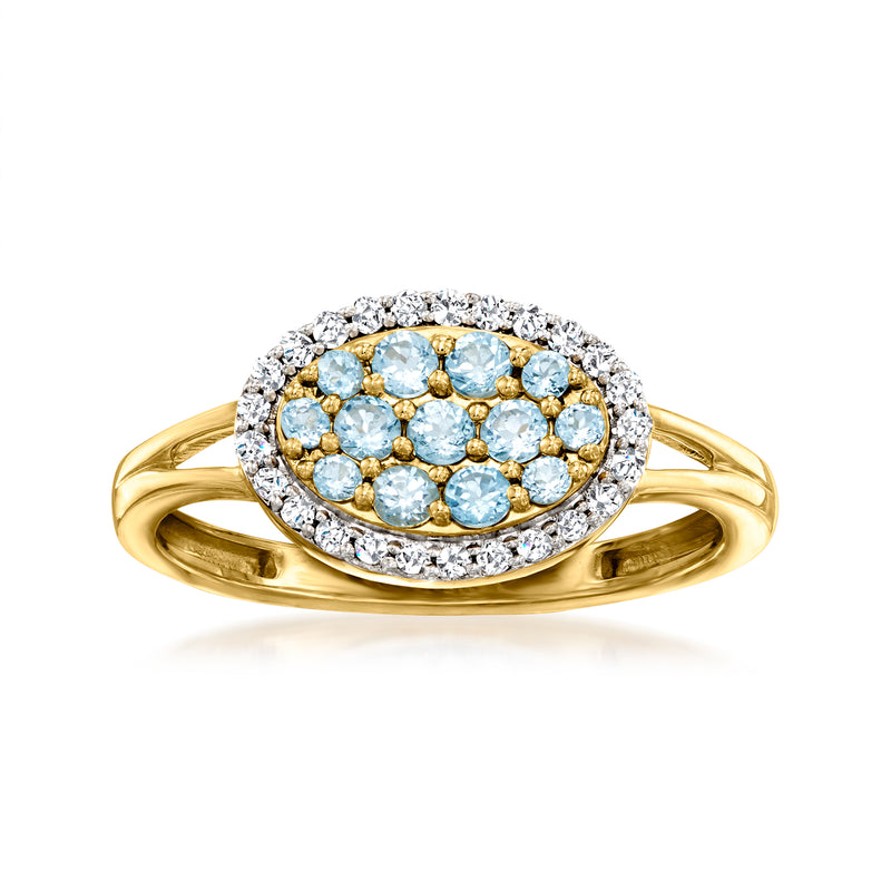 18kt gold over sterling oval ring, blue topaz center with diamond halo
