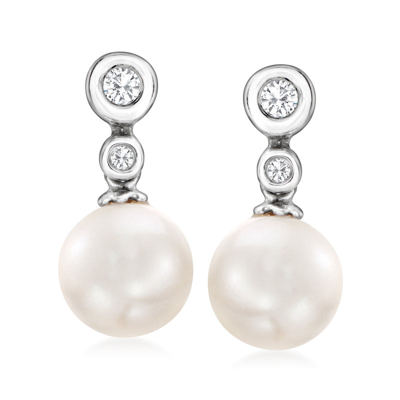 14kt white gold pearl drop earrings with round diamond accents and white cultured pearl