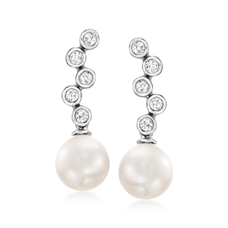 Pearl drop earrings with diamond halo stations and round white cultured pearl, white gold