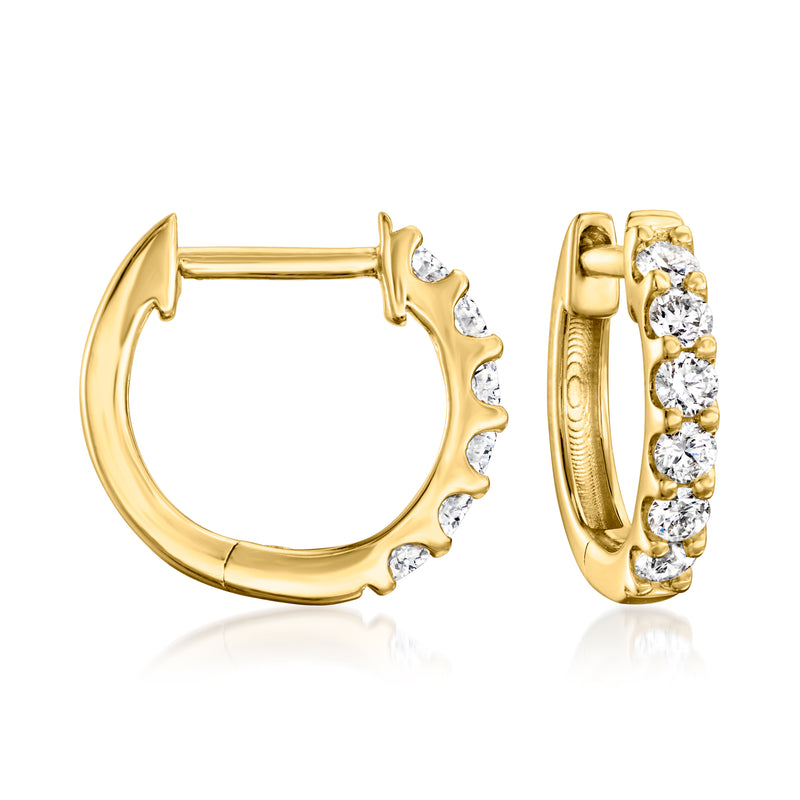 Gold hoop earrings with round lab-grown diamond accents, hinged clasp detail