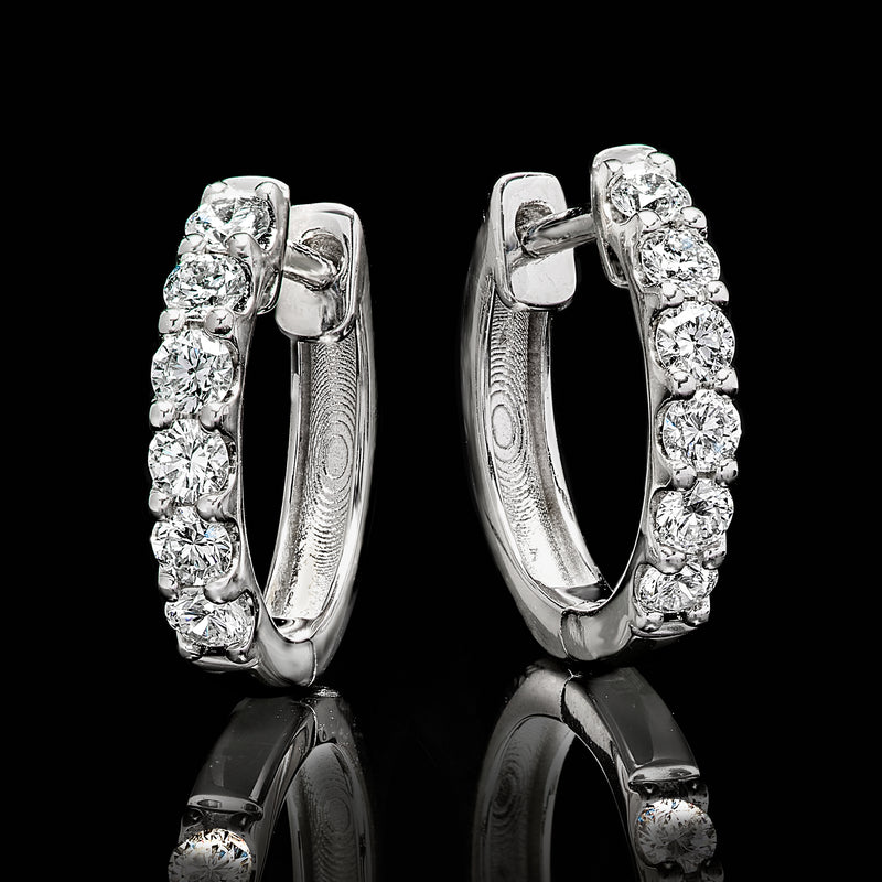 Side view huggie hoop earrings in sterling silver with lab-grown diamond row