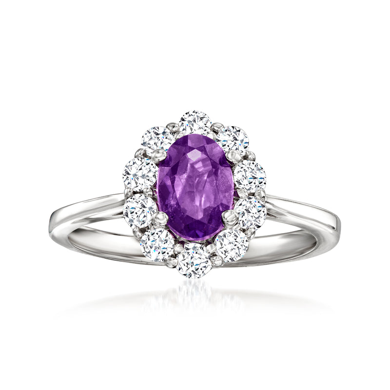 Oval amethyst center ring with round diamond halo in 14kt white gold band