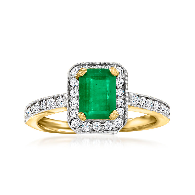 14kt yellow gold halo ring with emerald-cut green gemstone and diamonds