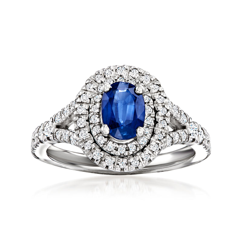 Oval sapphire ring with diamond halo in 14kt white gold