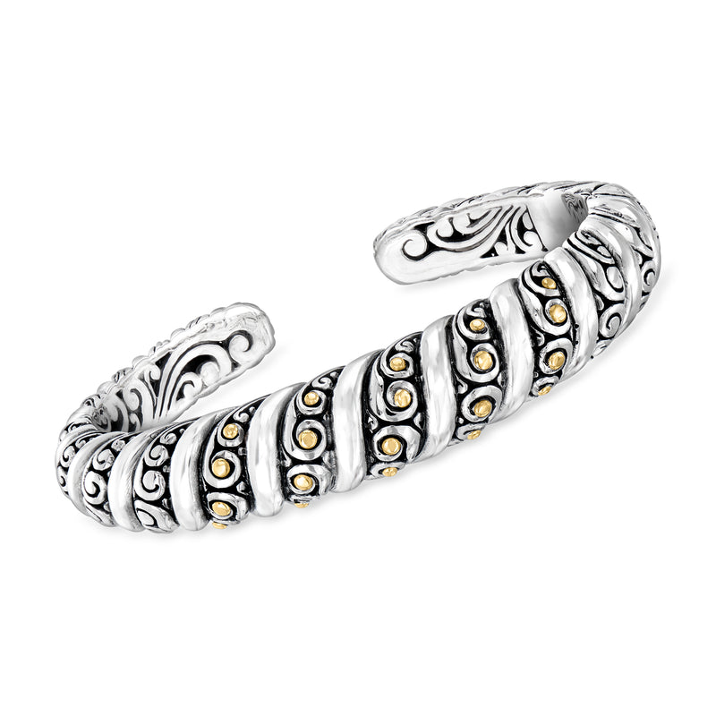 Bali-style twisted cuff bracelet in sterling silver with yellow gold dot accents