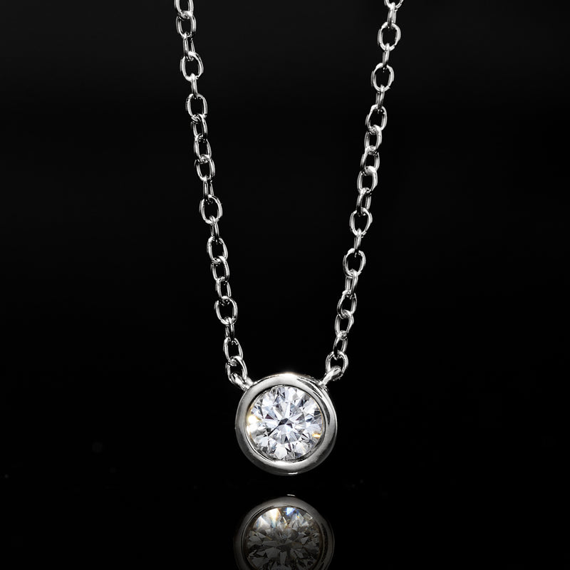 Sterling silver round bezel-set diamond pendant necklace on linked chain
