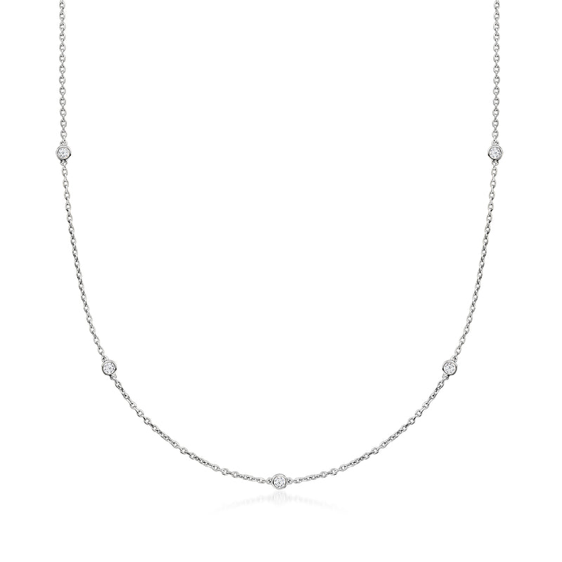 Sterling silver diamond station necklace with small round stones on a chain