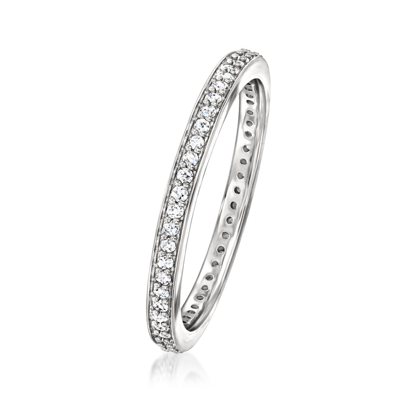 Sterling silver eternity band with round lab-grown diamonds, side view.