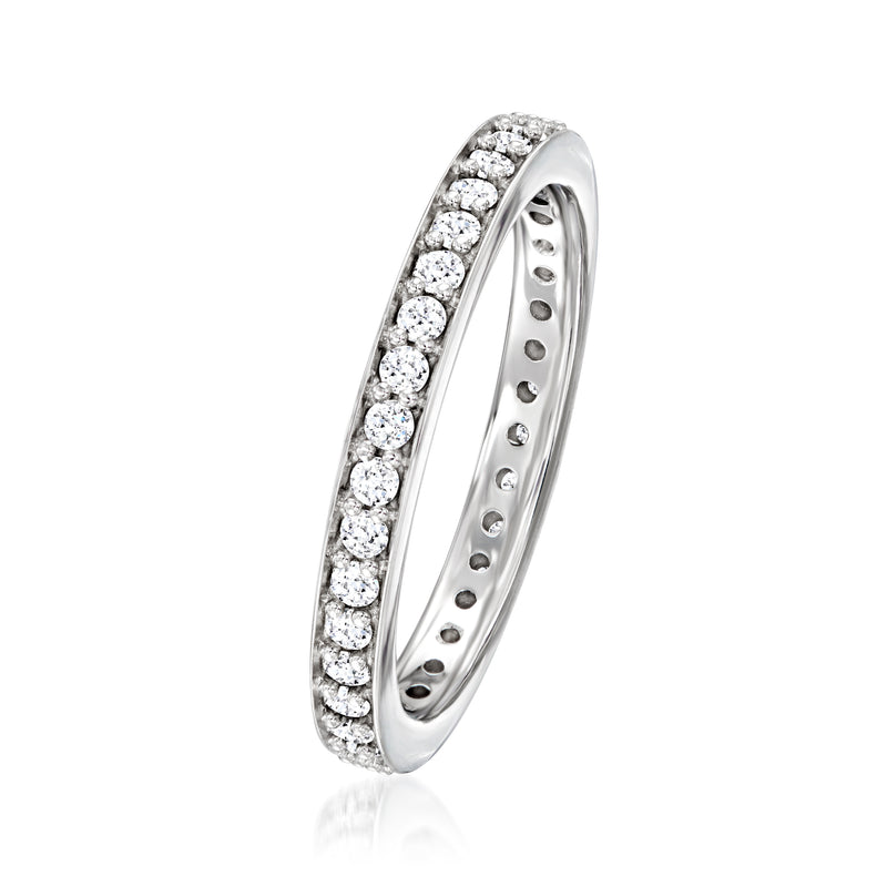 Sterling silver lab-grown diamond eternity band shown from the side, bezel-set stones