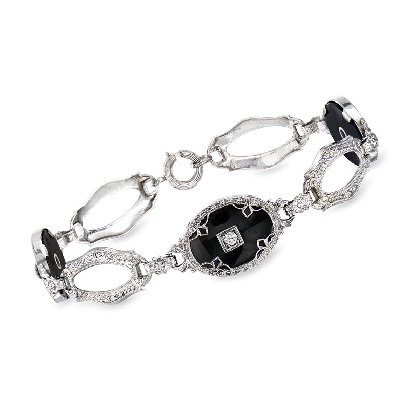Vintage white gold onyx and diamond bracelet with oval black center and link settings