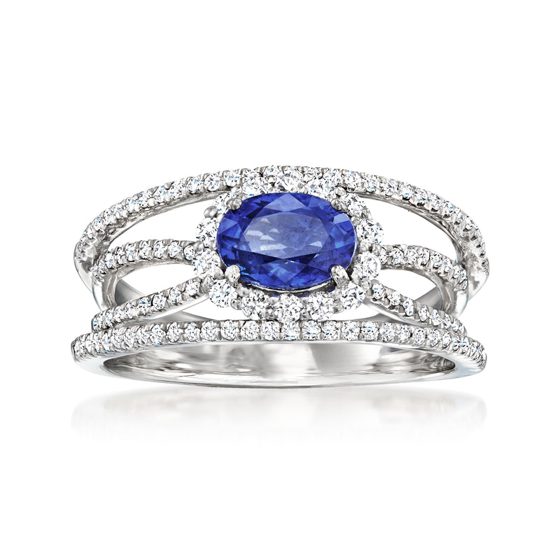 Platinum sapphire and diamond cocktail ring with oval blue center stone