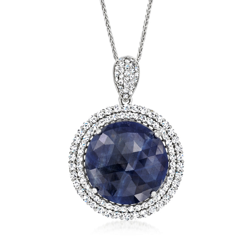 Platinum pendant necklace with blue sapphire center and diamond halo, teardrop bail