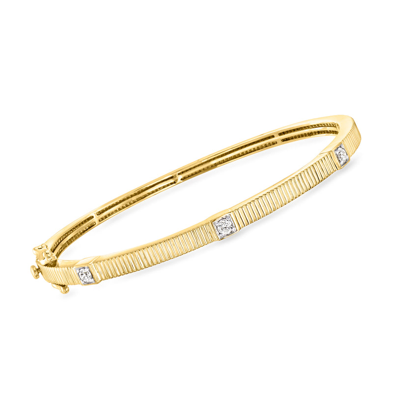 18kt yellow gold diamond station bangle bracelet with ribbed center and small round stones
