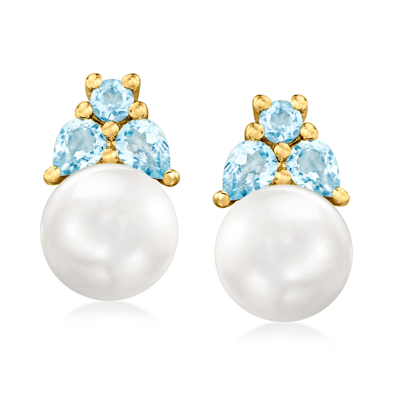 Gold post earrings with round white cultured pearl and sky-blue topaz clusters