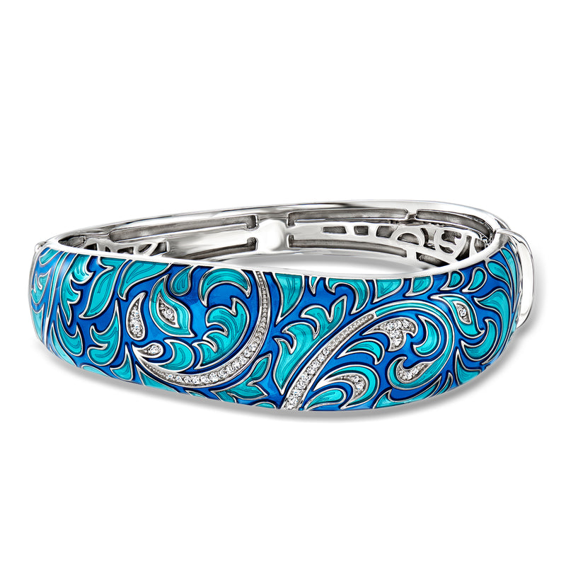 Sterling silver bangle with bright blue swirl enamel pattern