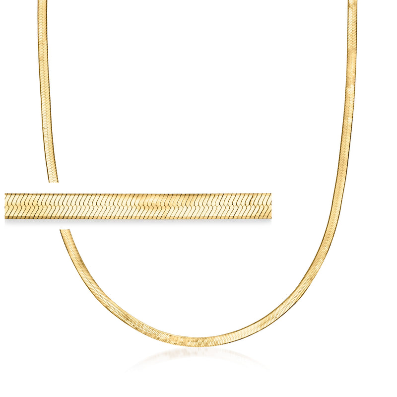 Gold-tone herringbone necklace chain, fine link design, curved close-up