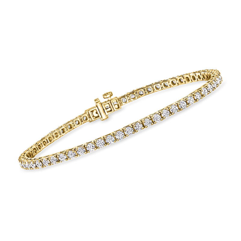 18kt gold over sterling tennis bracelet with round clear diamond stones in a row