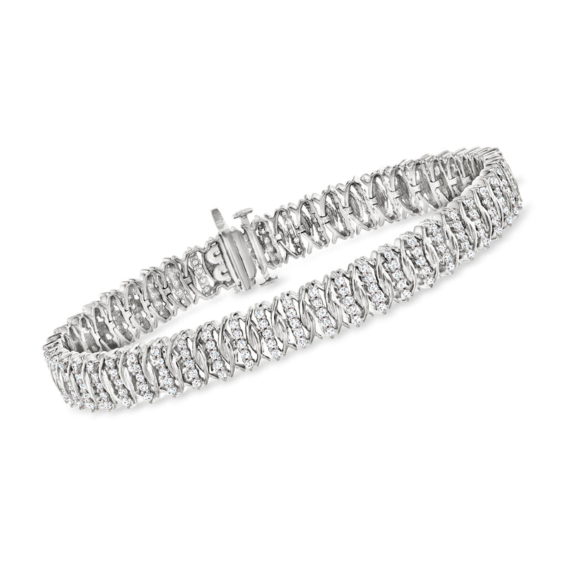 Sterling silver diamond tennis bracelet with oval fancy-link rows, clasp detail