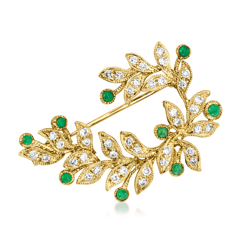 18kt yellow gold leaf pin with diamond accents and green emerald cabochons