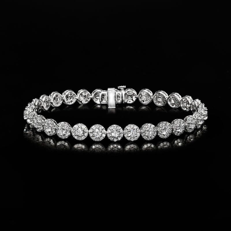 14kt white gold diamond tennis bracelet with round halo stones and box clasp