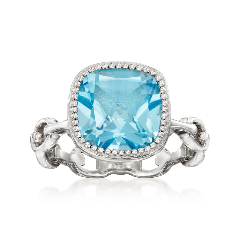 Sterling silver link ring with sky-blue topaz center and diamond accents