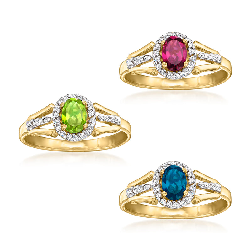 Gold-tone three-ring set with round halo settings and green, pink, and blue center stones