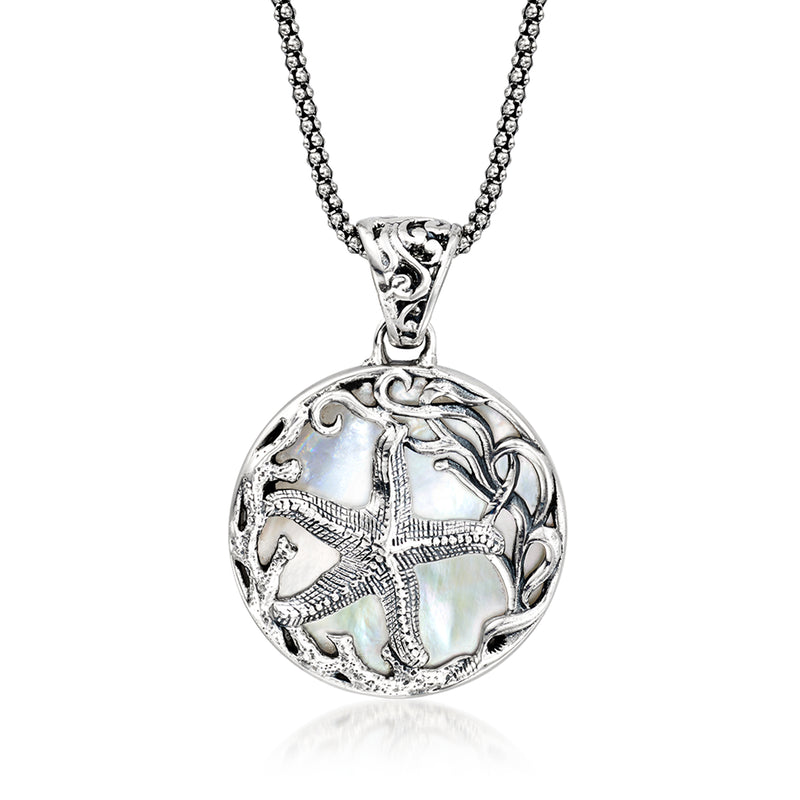 Sterling silver sea life pendant necklace with round ocean-themed mother-of-pearl locket