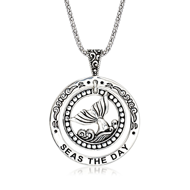 Sterling silver whale medallion pendant necklace with circular whale design, 'SEAS THE DAY'.