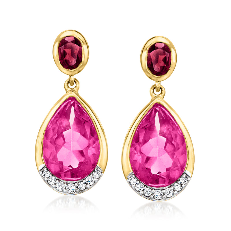 Gold drop earrings with pink teardrop gemstones and diamond-accented halo bezel