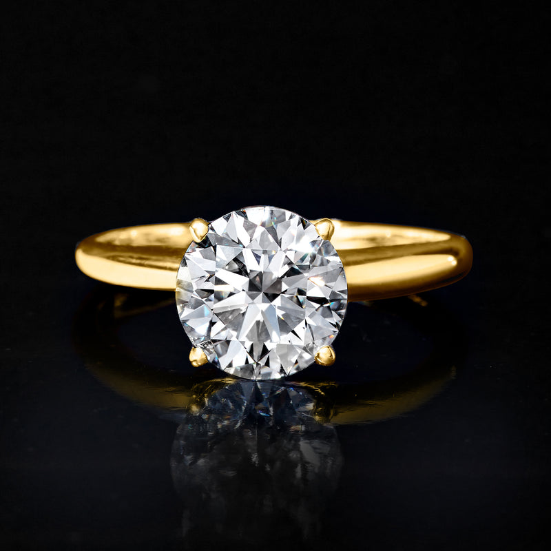 14kt yellow gold solitaire diamond ring with round diamond center