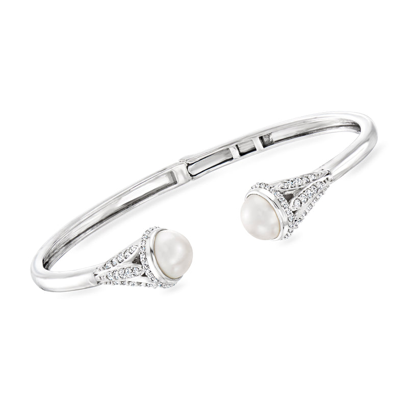 Sterling silver cuff bracelet with two cultured pearl and clear stone accents