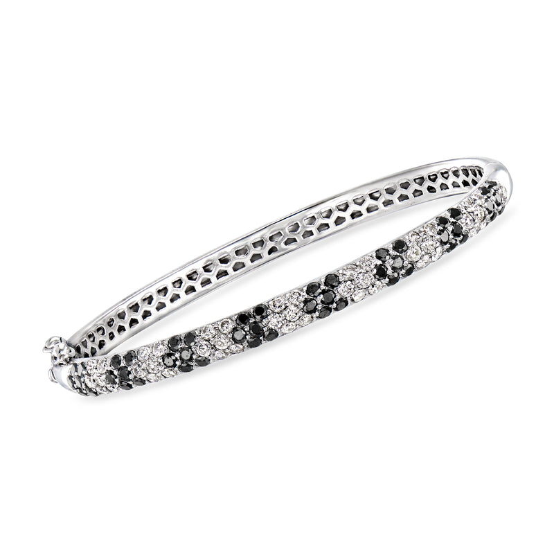 Vintage 18kt white gold bangle bracelet with black and white diamonds and honeycomb detail