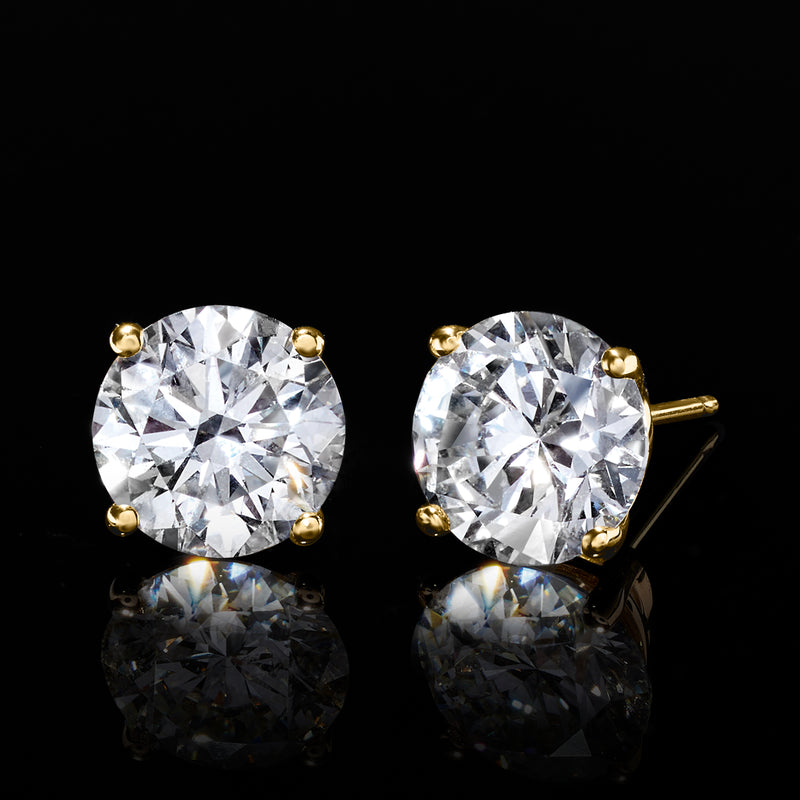 Round lab-grown diamond stud earrings in 14kt yellow gold, side view with posts