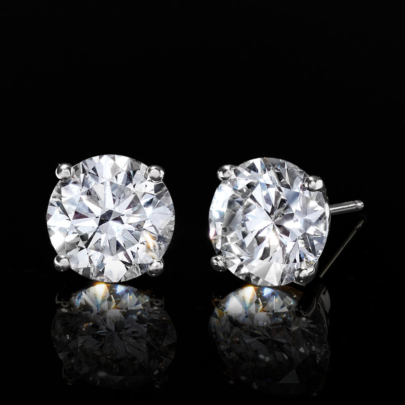 Round lab-grown diamond stud earrings in 14kt white gold, bezel-set, pair