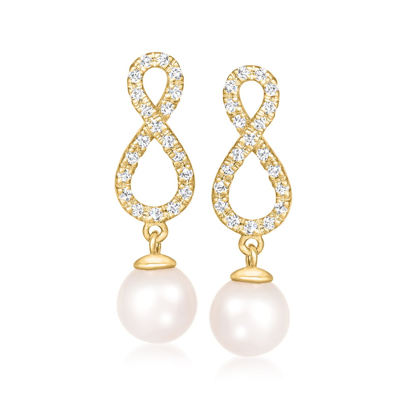 14kt yellow gold drop earrings with diamond swirl frames and white cultured pearl drops