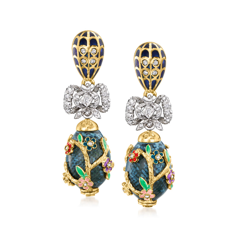 Vintage drop earrings with blue enamel floral motifs and clear gemstone accents in gold