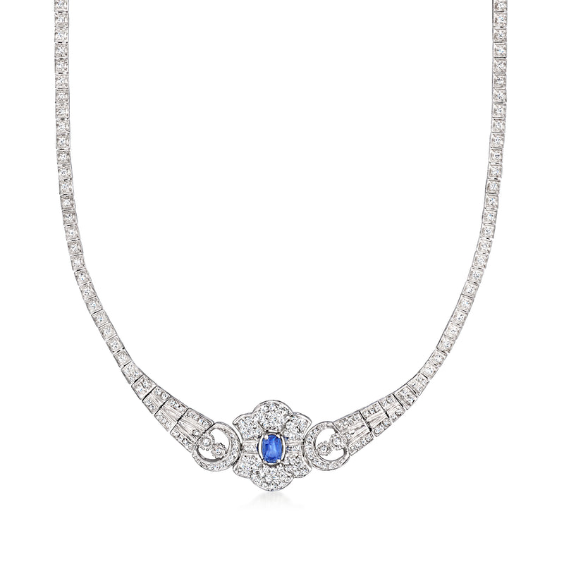 14kt white gold graduated diamond necklace with oval blue sapphire center cluster