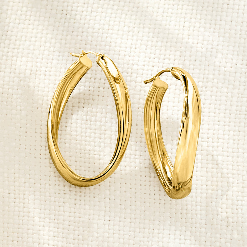Italian 18kt yellow gold curved hoop earrings, slim oval hoops with glossy finish