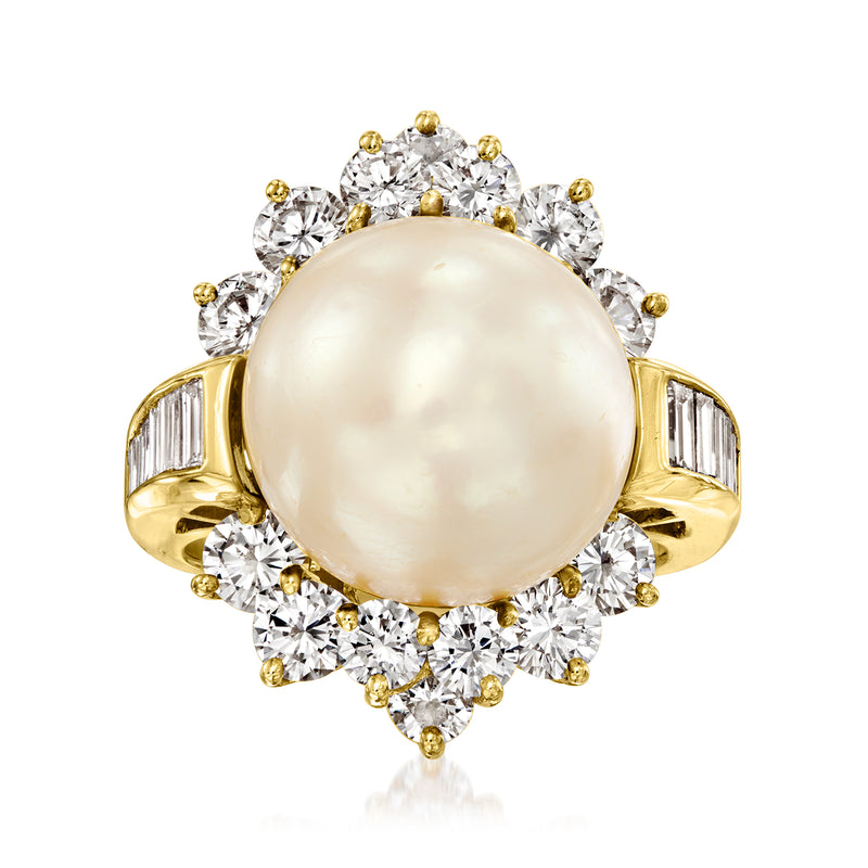 18k yellow gold ring with large cultured South Sea pearl and diamond halo, baguette accents