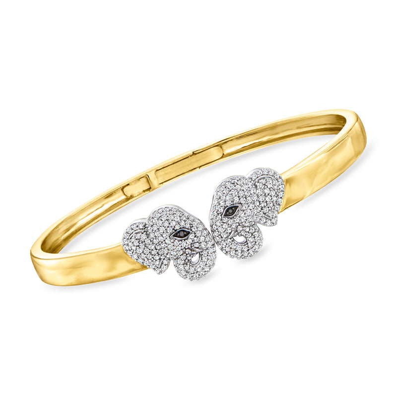 Two-tone sterling silver diamond elephant bangle with pave heads and black eyes