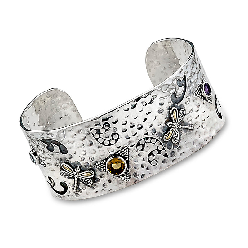 Sterling silver dragonfly cuff bracelet with engraved motifs and yellow and purple gem accents