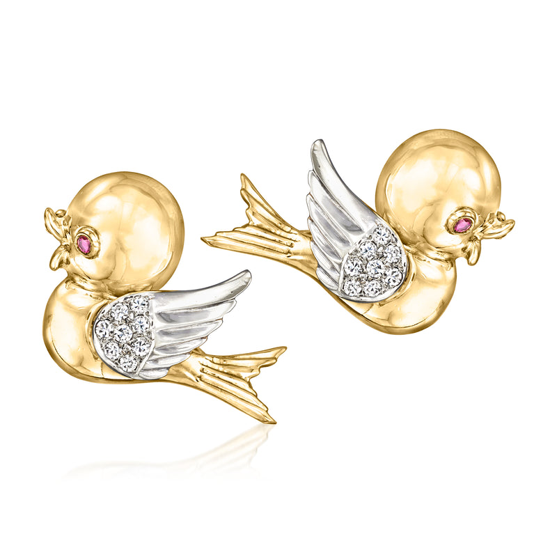 Vintage bird pin set in yellow gold with diamond wings and ruby eye accents, two pins