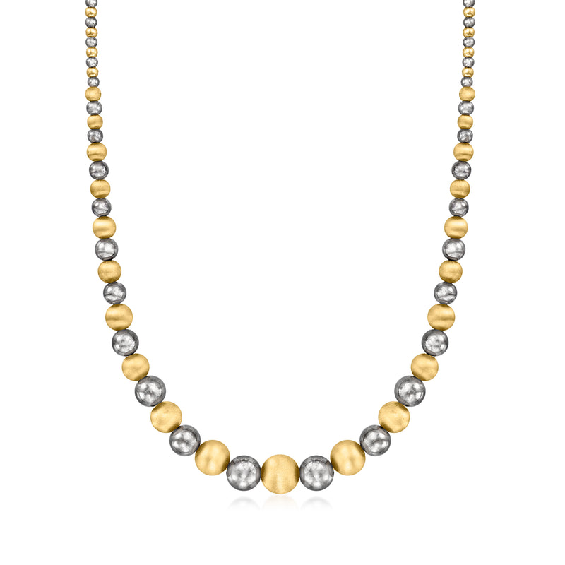 Graduated bead necklace with alternating yellow gold and silver round beads