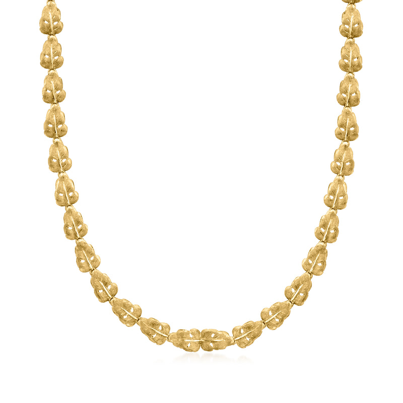 18kt yellow gold leaf link necklace with repeating coin-like links